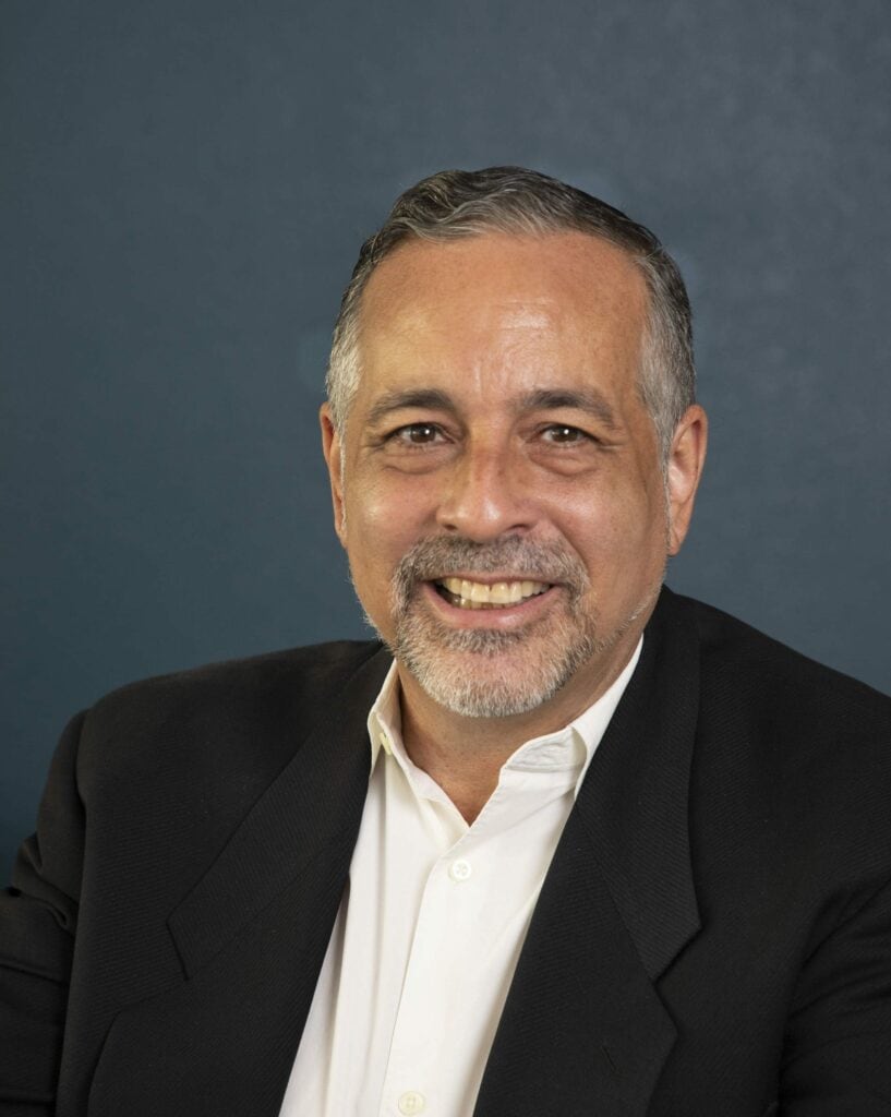 headshot of Director Paul Ortega